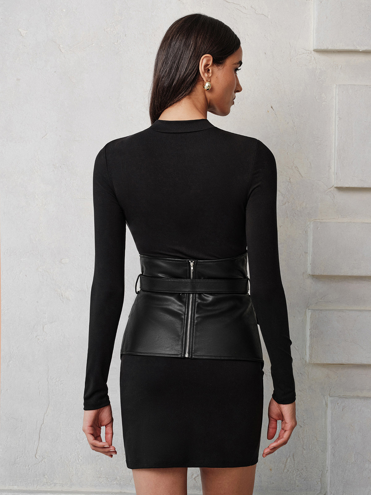 Vestido de punto con superposición de corsé de imitación de piel